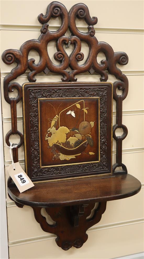 A Chinese lacquered hardwood wall bracket W.31cm